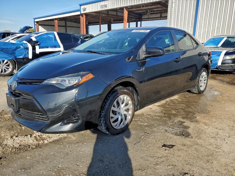 TOYOTA COROLLA L 2017 with VIN 5YFBURHE3HP657376 - Photo from auction