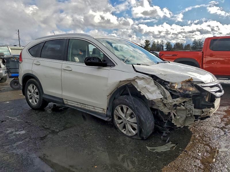 Photo 4 from auction – 2014 HONDA CR-V with VIN 5J6RM4H73EL119259
