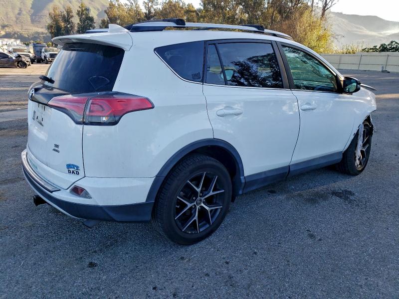 Photo 3 from auction – 2016 TOYOTA RAV4 SE with VIN 2T3JFREV1GW442108