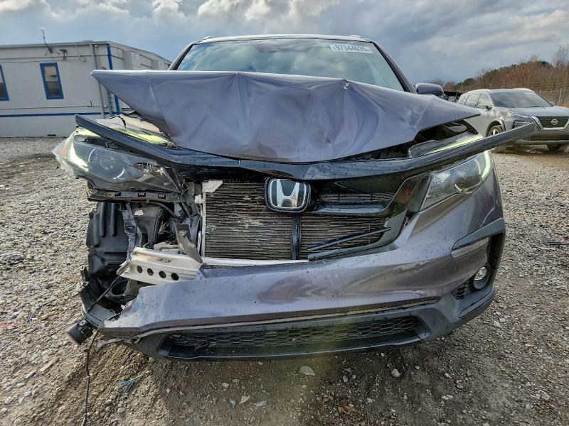 Photo 5 from auction – 2021 HONDA PILOT SE with VIN 5FNYF5H24MB045308