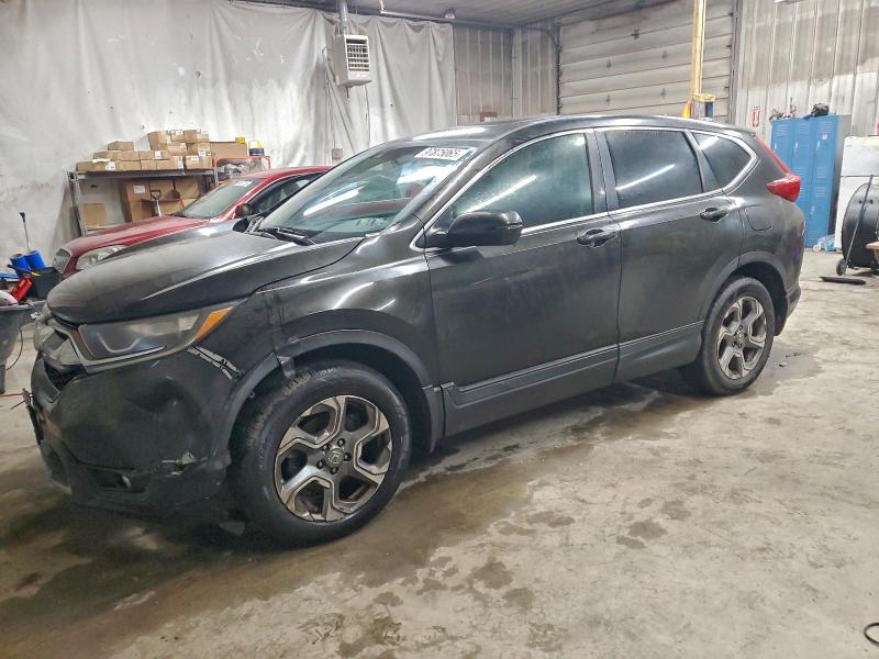 HONDA CR-V 2018 with VIN 2HKRW2H81JH635583 - Photo from auction