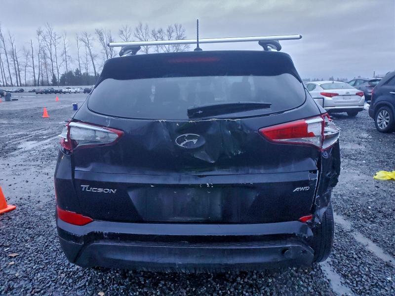 Photo 6 from auction – 2016 HYUNDAI TUCSON LIM with VIN KM8J3CA42GU155016