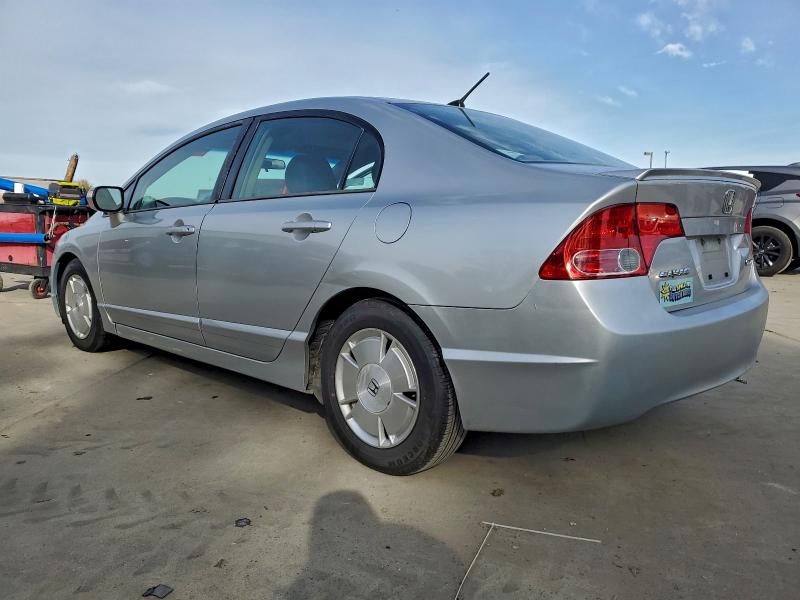 Photo 2 from auction – 2006 HONDA CIVIC HYBR with VIN JHMFA36256S023027