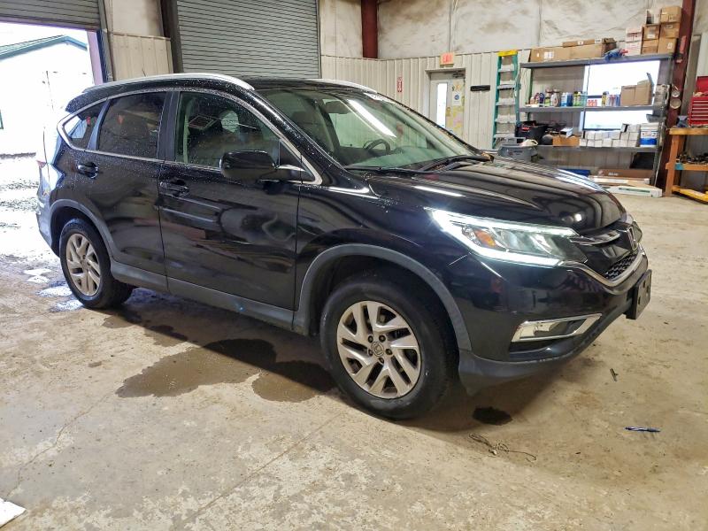 Photo 4 from auction – 2016 HONDA CR-V EXL with VIN 2HKRM4H73GH709393