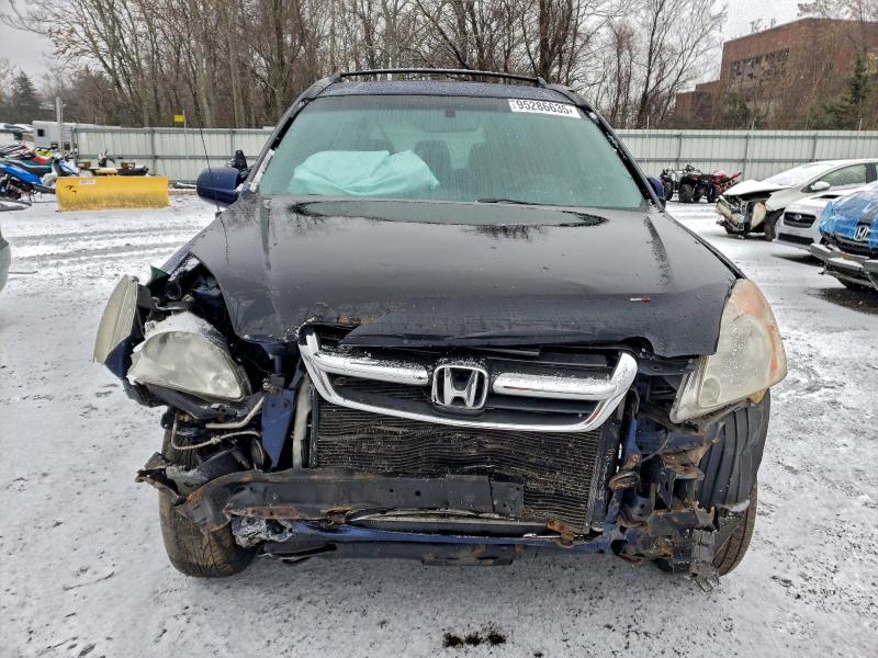 Photo 5 from auction – 2004 HONDA CR-V EX with VIN JHLRD77834C038572