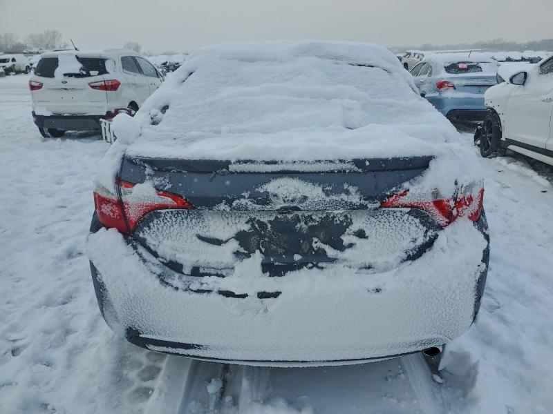Photo 6 from auction – 2014 TOYOTA COROLLA L with VIN 5YFBURHE7EP044513