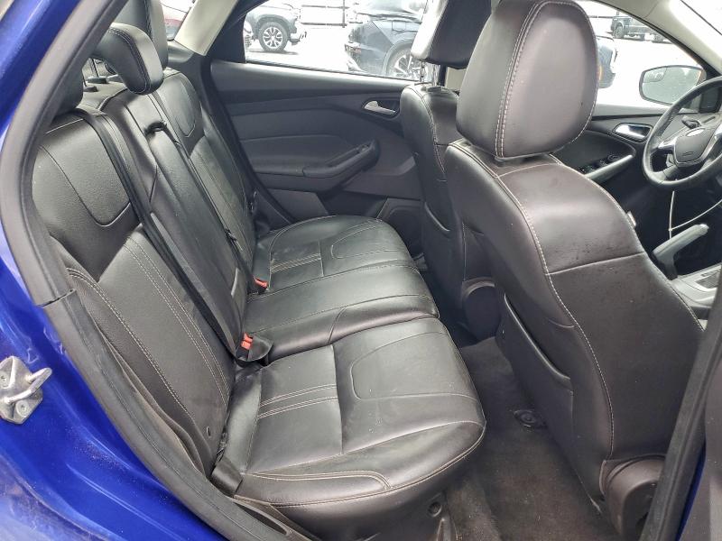 Photo 10 from auction – 2014 FORD FOCUS SE with VIN 1FADP3F22EL357635