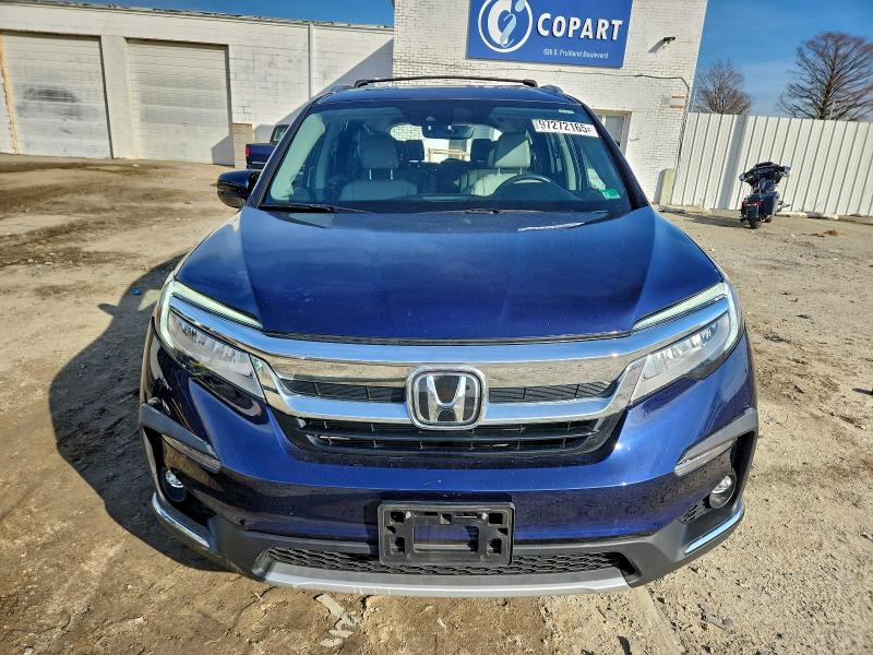 Photo 5 from auction – 2022 HONDA PILOT TOUR with VIN 5FNYF5H67NB017538