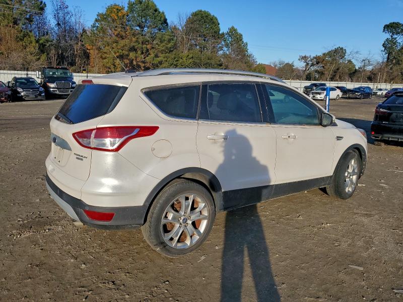 Photo 3 from auction – 2015 FORD ESCAPE TIT with VIN 1FMCU9J92FUA34828