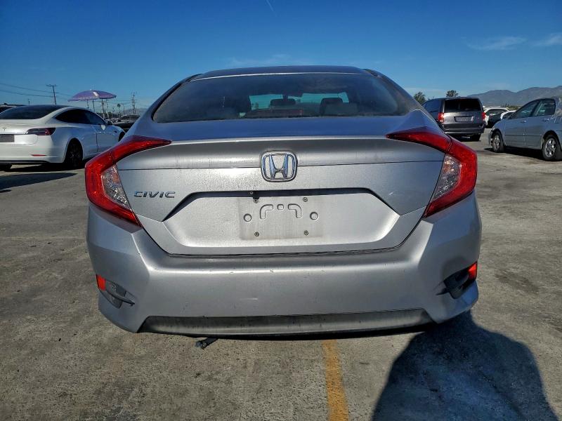 Photo 6 from auction – 2017 HONDA CIVIC LX with VIN 2HGFC2F52HH508317