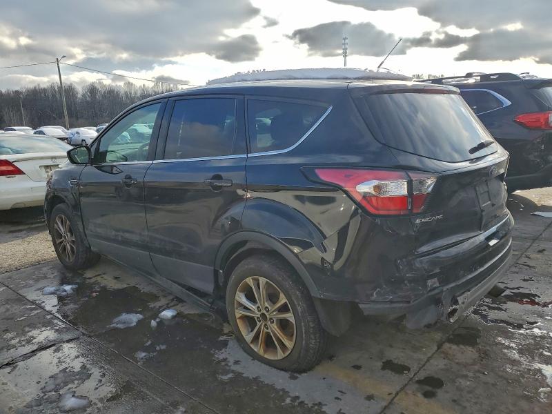 Photo 2 from auction – 2017 FORD ESCAPE with VIN 1FMCU9GD1HUE04634