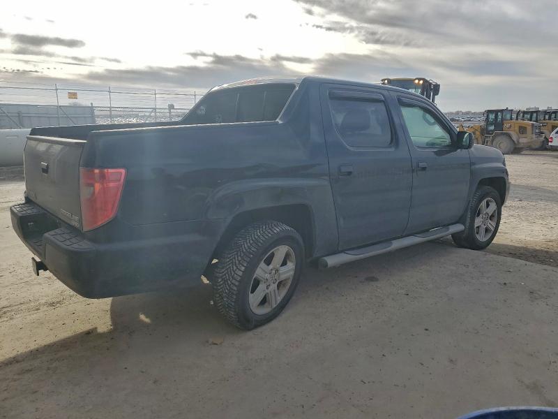 Photo 3 from auction – 2011 HONDA RIDGELINE with VIN 5FPYK1F50BB453939