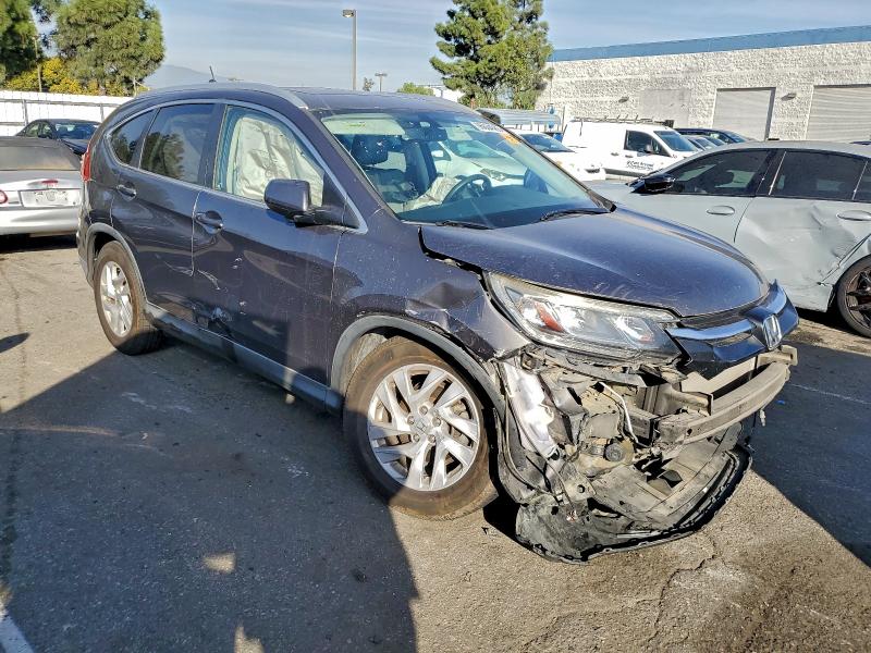 Photo 4 from auction – 2015 HONDA CR-V EXL with VIN 2HKRM3H79FH504024