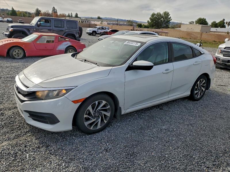 HONDA CIVIC EX 2016 with VIN 2HGFC2F71GH535234 - Photo from auction