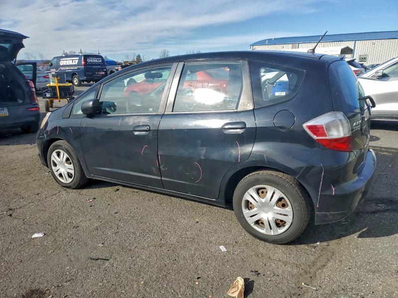 Photo 2 from auction – 2009 HONDA FIT with VIN JHMGE88259C002941