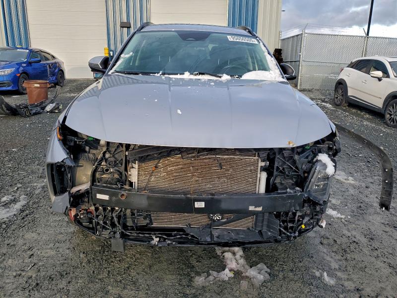Photo 5 from auction – 2022 HYUNDAI TUCSON SEL with VIN KM8JBCAE1NU092385