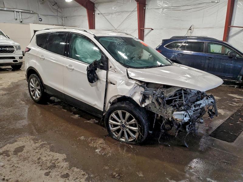 Photo 4 from auction – 2018 FORD ESCAPE TIT with VIN 1FMCU9J90JUA68341