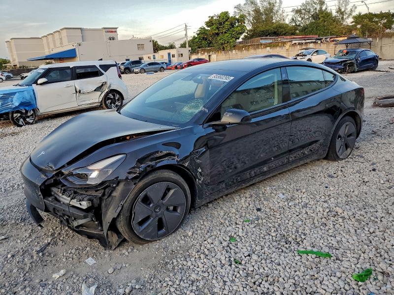 TESLA MODEL 3 2023 with VIN 5YJ3E1EA3PF487499 - Photo from auction