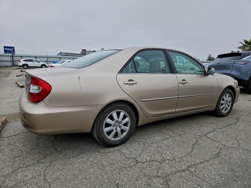 Photo 3 from auction – 2002 TOYOTA CAMRY LE with VIN JTDBE32K020129207
