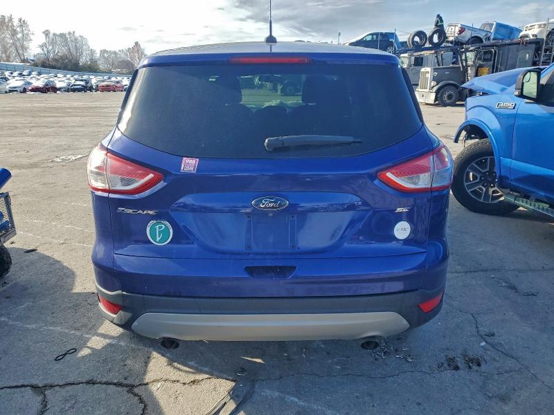 Photo 6 from auction – 2016 FORD ESCAPE SE with VIN 1FMCU0G79GUA26244
