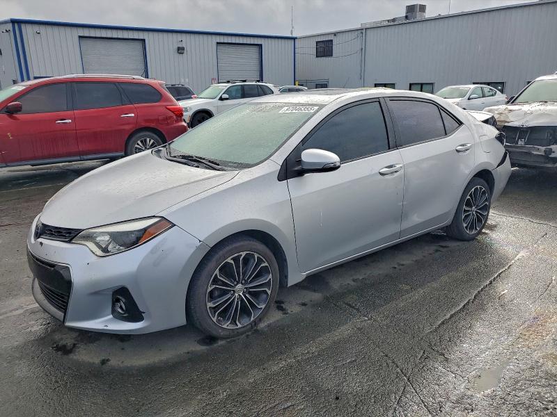 TOYOTA COROLLA L 2014 with VIN 5YFBURHE9EP111046 - Photo from auction