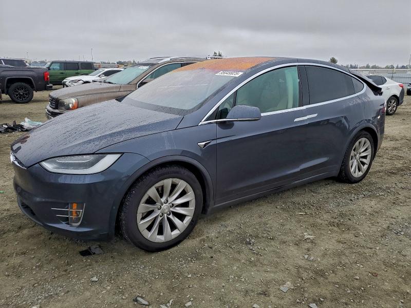 TESLA MODEL X 2018 with VIN 5YJXCAE22JF129821 - Photo from auction