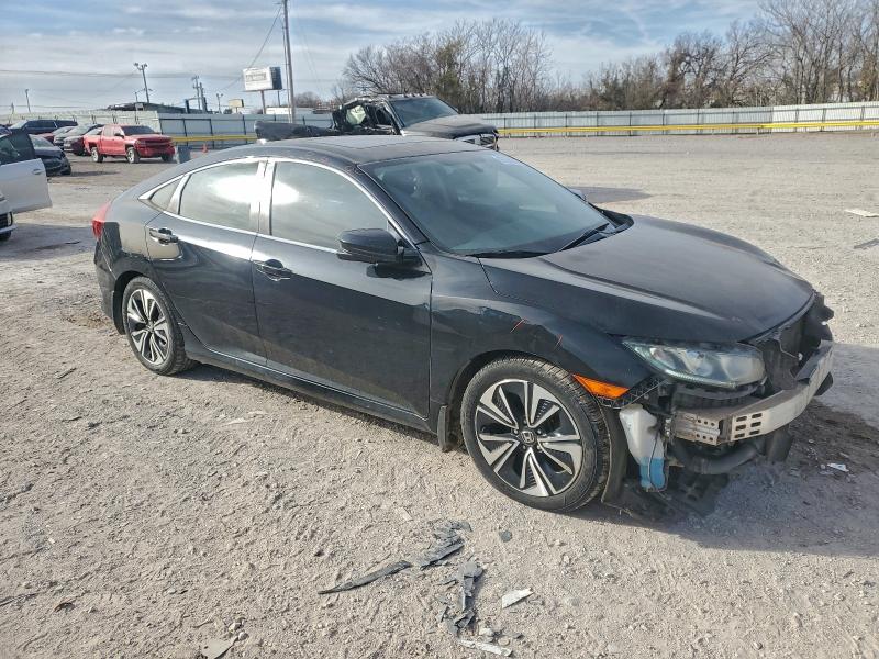 Photo 4 from auction – 2016 HONDA CIVIC with VIN 2HGFC1F33GH631017