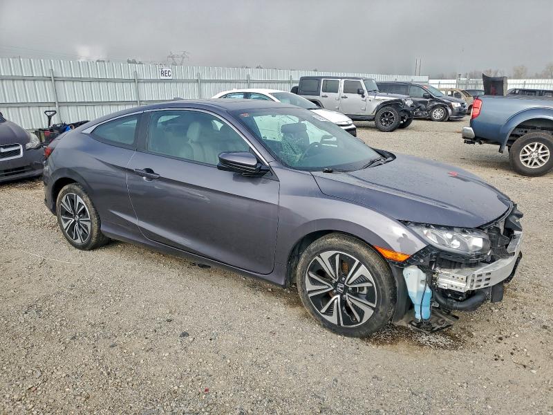 Photo 4 from auction – 2017 HONDA CIVIC EXL with VIN 2HGFC3B74HH356148
