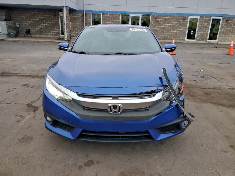 Photo 5 from auction – 2017 HONDA CIVIC TOUR with VIN 2HGFC3B96HH352619