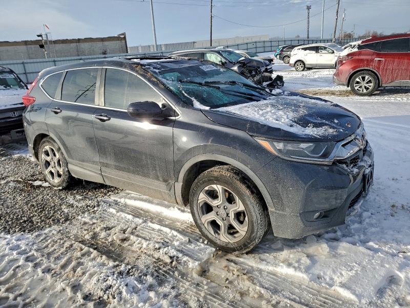 Photo 4 from auction – 2018 HONDA CR-V EX with VIN 7FARW2H59JE084585