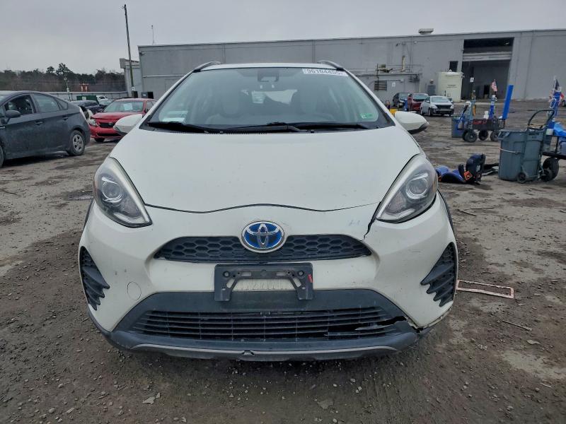 Photo 5 from auction – 2018 TOYOTA PRIUS C with VIN JTDKDTB33J1619726
