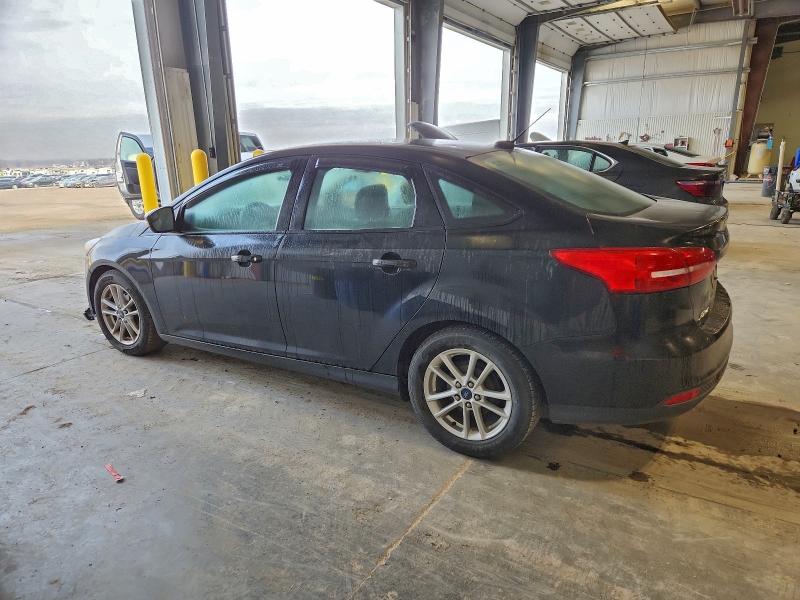 Photo 2 from auction – 2015 FORD FOCUS SE with VIN 1FADP3F24FL254492