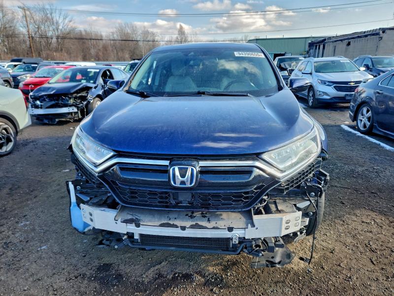 Photo 5 from auction – 2022 HONDA CR-V EXL with VIN 5J6RT6H80NL033141