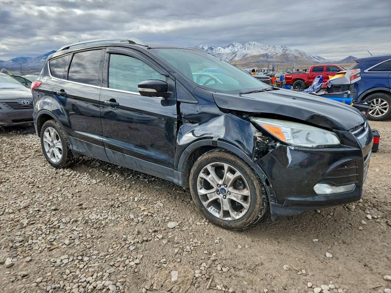 Photo 4 from auction – 2015 FORD ESCAPE TIT with VIN 1FMCU9J92FUC45348