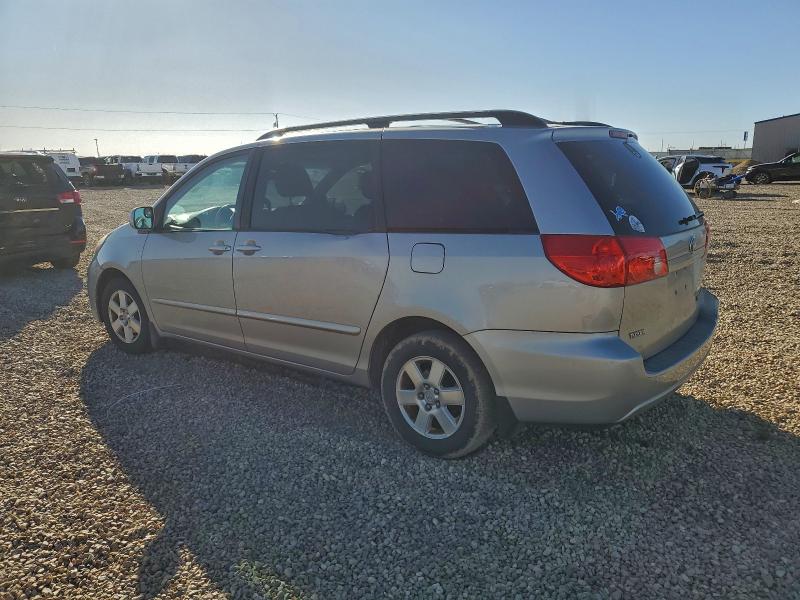 Photo 2 from auction – 2010 TOYOTA SIENNA XLE with VIN 5TDYK4CC5AS299090