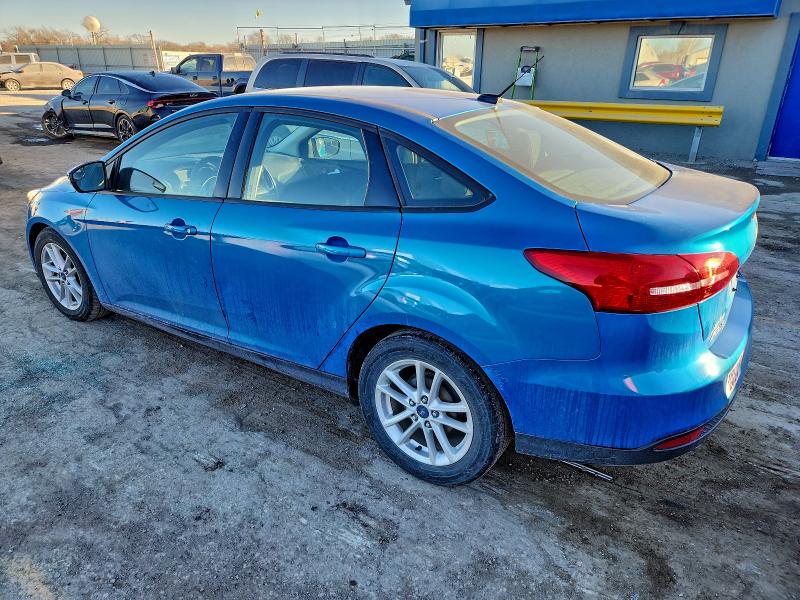 Photo 2 from auction – 2015 FORD FOCUS SE with VIN 1FADP3F23FL239241