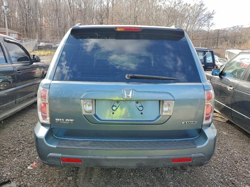 Photo 6 from auction – 2006 HONDA PILOT LX with VIN 5FNYF18126B027182