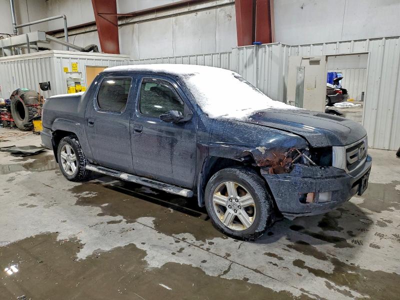 Photo 4 from auction – 2011 HONDA RIDGELINE with VIN 5FPYK1F59BB004517