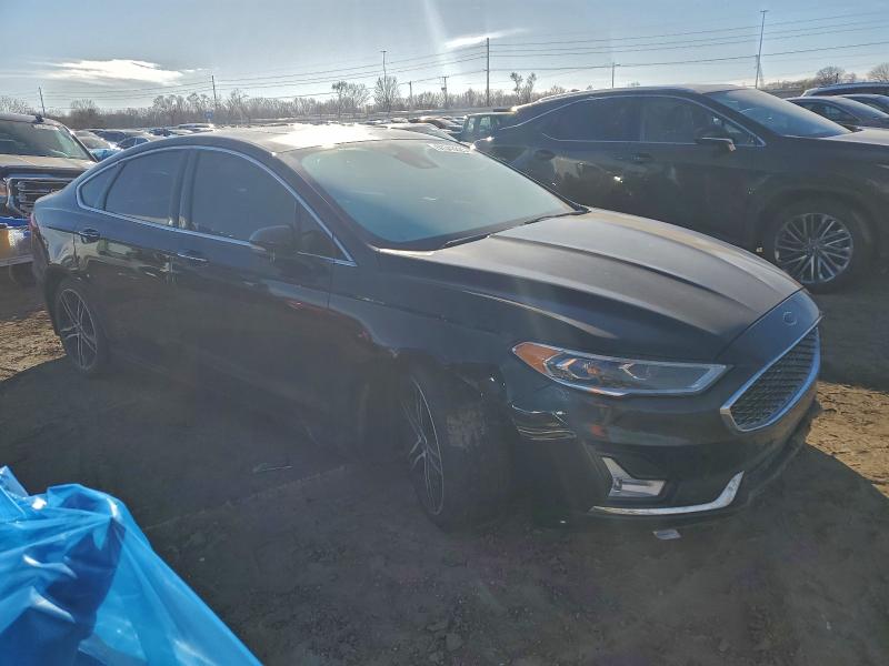 Photo 4 from auction – 2019 FORD FUSION TIT with VIN 3FA6P0D92KR144110