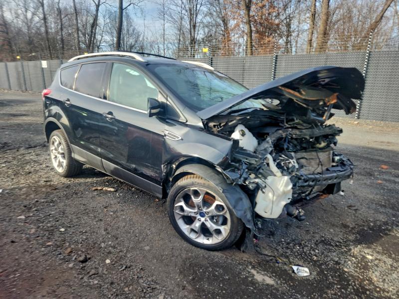 Photo 4 from auction – 2014 FORD ESCAPE TIT with VIN 1FMCU9J98EUA73227