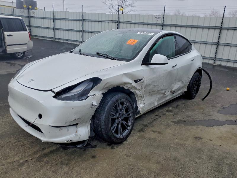 TESLA MODEL Y 2024 with VIN 7SAYGDED9RF110760 - Photo from auction