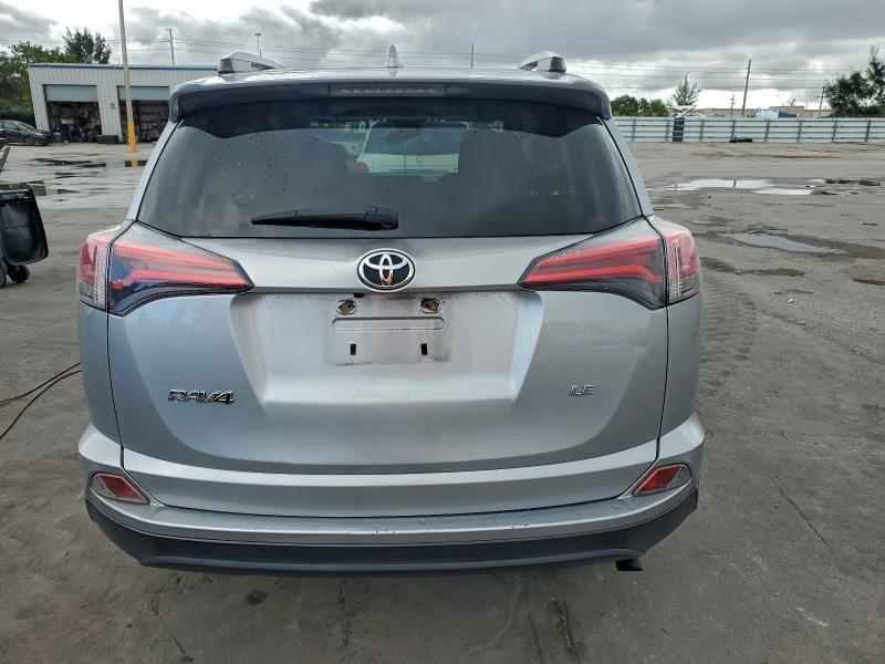 Photo 6 from auction – 2018 TOYOTA RAV4 LE with VIN JTMZFREV9JJ174739
