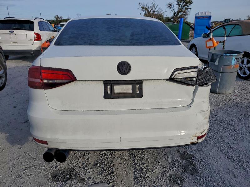 Photo 6 from auction – 2018 VOLKSWAGEN JETTA S with VIN 3VW2B7AJXJM227954