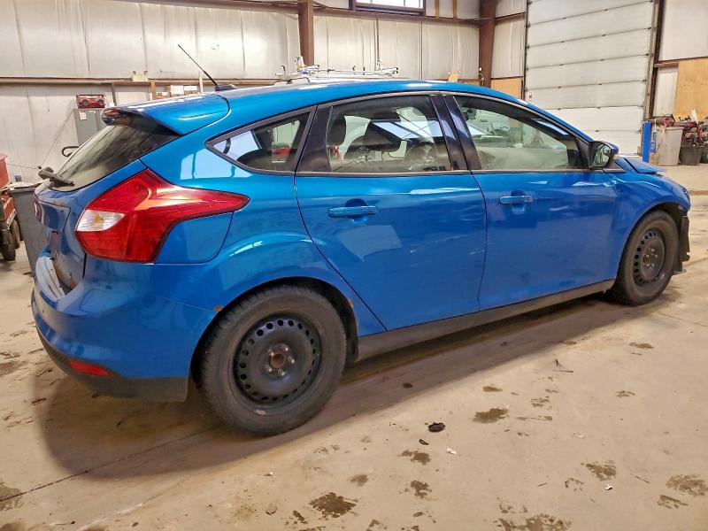 Foto 3 de la subasta – 2012 FORD FOCUS SE con VIN 1FAHP3K20CL345200