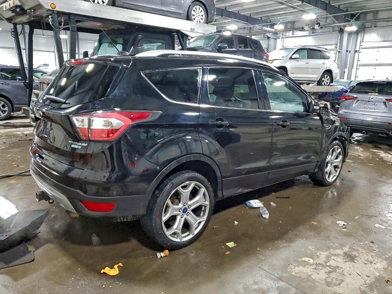 Photo 3 from auction – 2017 FORD ESCAPE TIT with VIN 1FMCU9J96HUA49254