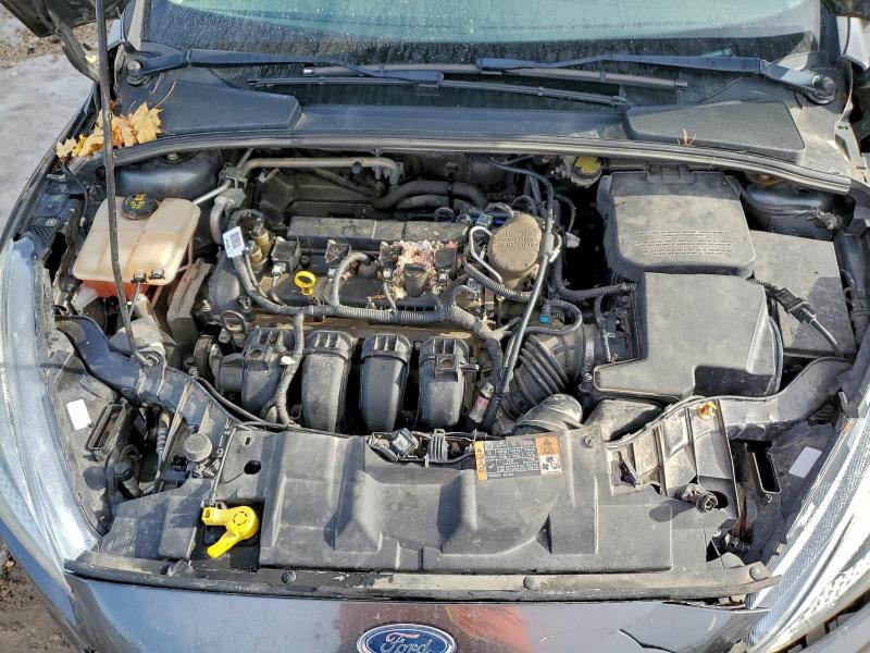 Photo 11 from auction – 2015 FORD FOCUS SE with VIN 1FADP3F21FL256023