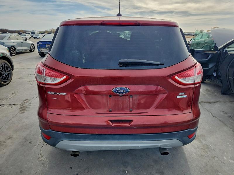 Photo 6 from auction – 2015 FORD ESCAPE with VIN 1FMCU9GX7FUC10309