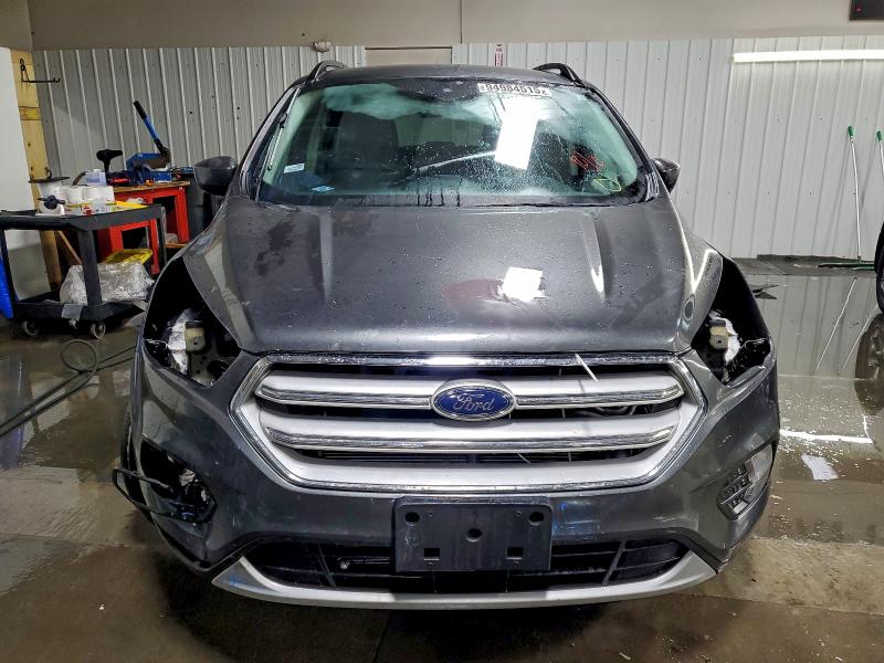 Photo 5 from auction – 2018 FORD ESCAPE SE with VIN 1FMCU0GD9JUA03382
