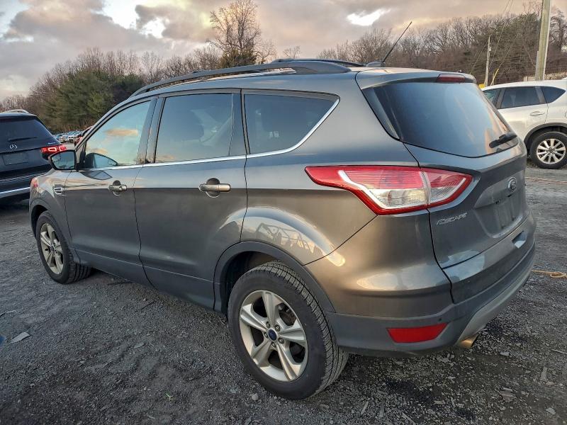 Photo 2 from auction – 2014 FORD ESCAPE SE with VIN 1FMCU9GX2EUA96539