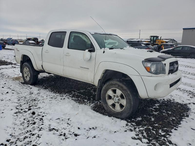 Photo 4 from auction – 2011 TOYOTA TACOMA DOU with VIN 3TMMU4FN2BM034795